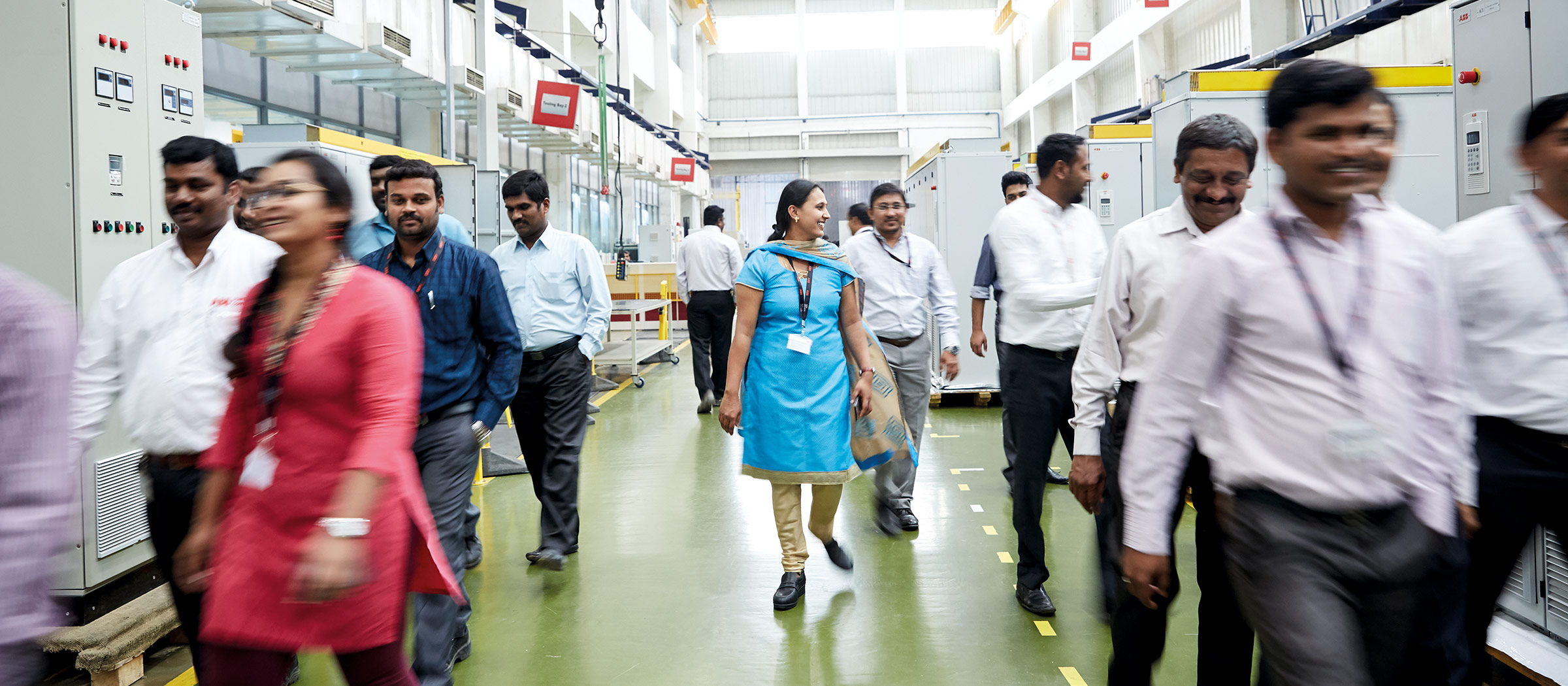 People walking through a hallway (photo)